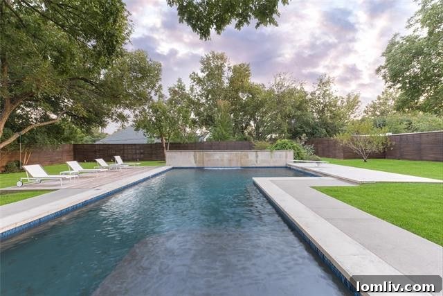 Bernbaum/Magadini's Hill Country Modern Masterpiece 14 Lush Backyard and Patio Area