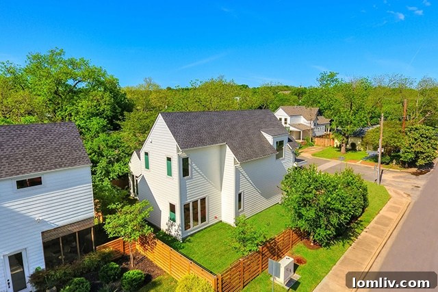 Aerial view of the Stacy Lane neighborhood with mature trees and corner lot, showcasing its appeal.