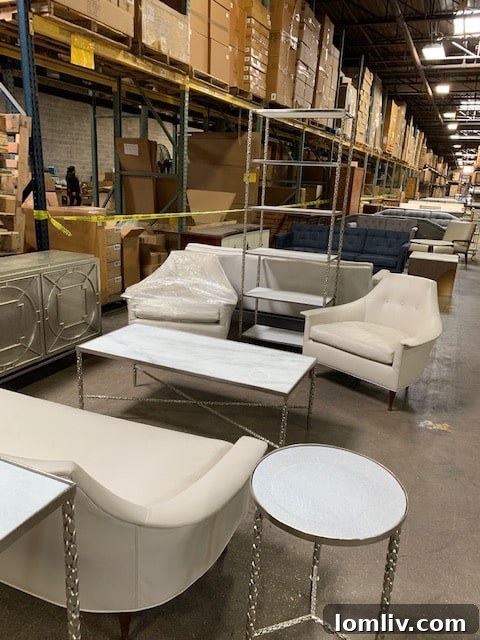 Global Views sale inventory: Contemporary sofa and stylish floor lamp