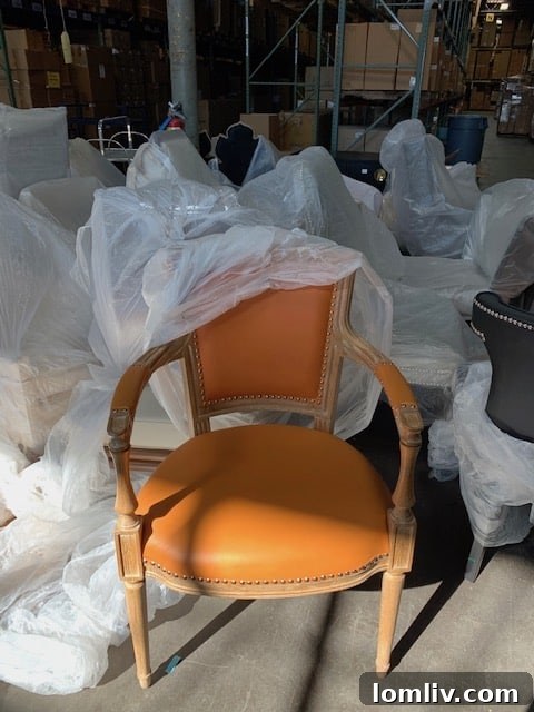 Global Views sale inventory: Designer armchair and abstract sculpture