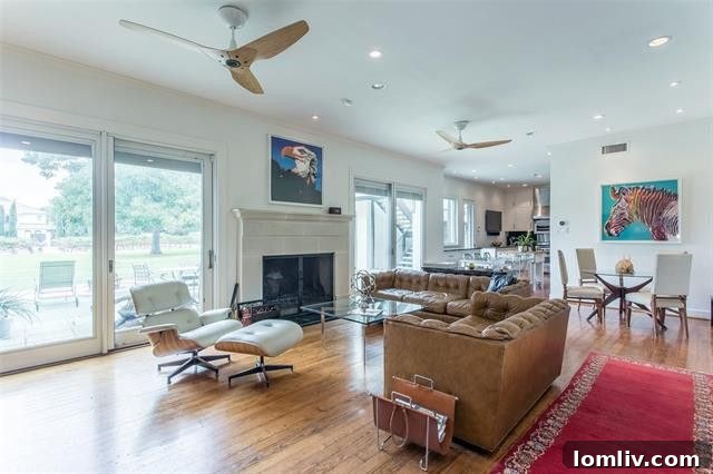 The sophisticated gourmet kitchen, featuring soapstone countertops, professional-grade stainless steel appliances, and a full-size wine rack.