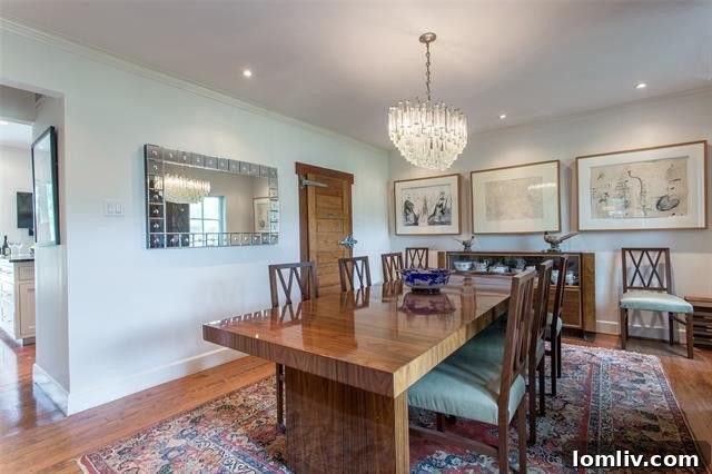 An inviting interior view of the Inwood Road estate, highlighting the elegant hardwood floors and classic decor.