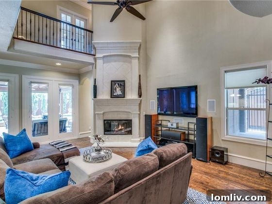 Sondra Drive Grandeur: An Expansive Lakewood Residence 7 Transformed Living Area with Neutral Decor