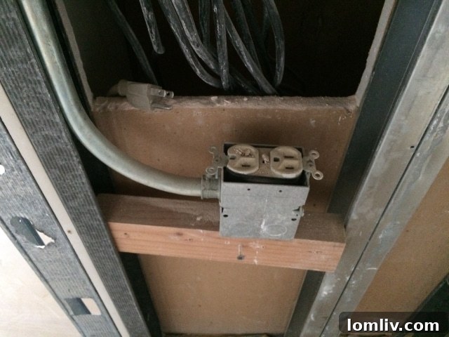 Dangerous Exposed Electrical Outlet Discovered During Demolition