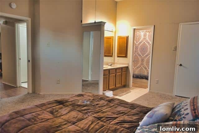 Spacious master bathroom with dual sinks and shower/tub combination