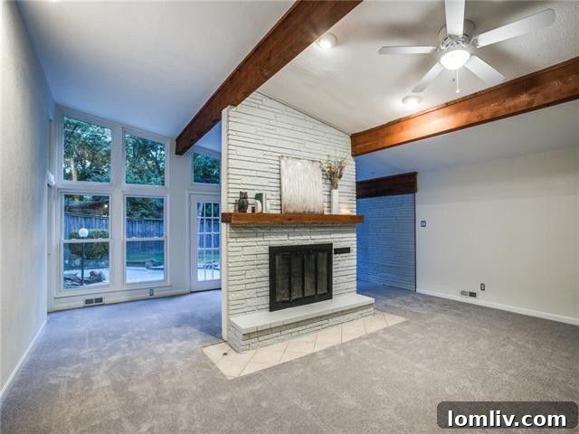 Before staging of room with a dividing fireplace