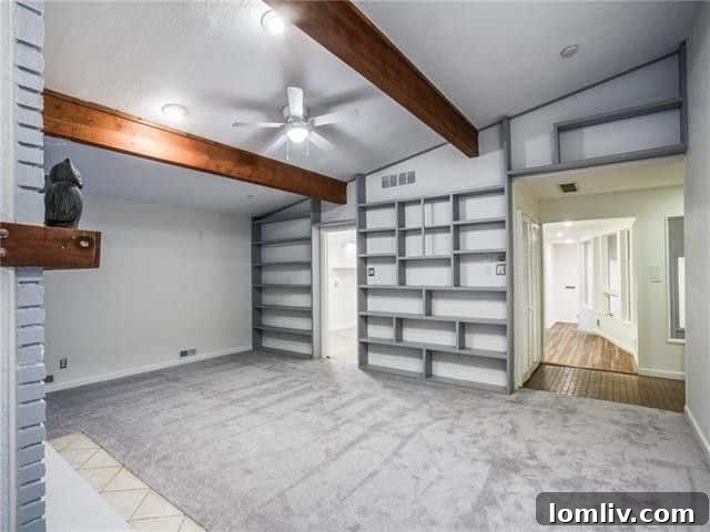 After staging, carpet removed, highlighting built-ins
