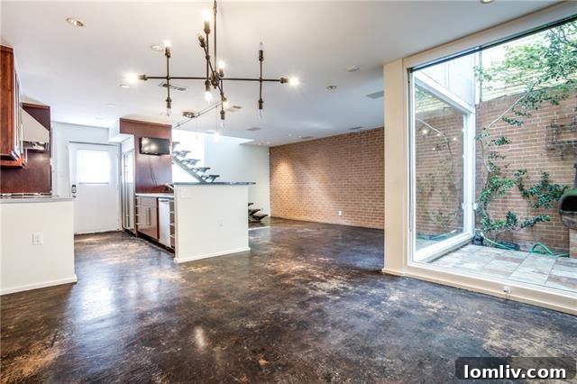 Modern kitchen with blue pearl granite in a Bud Oglesby Dallas townhome