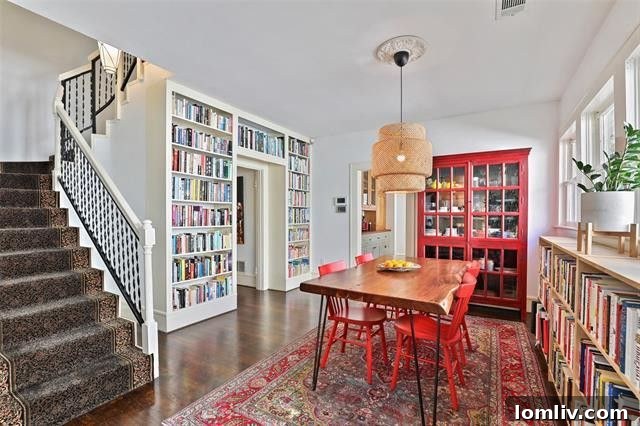 Kessler Park's Holiday Surprise: The Splurge Versus The Smart Steal 4 Elegantly decorated living room with a brick fireplace in the Tudor home