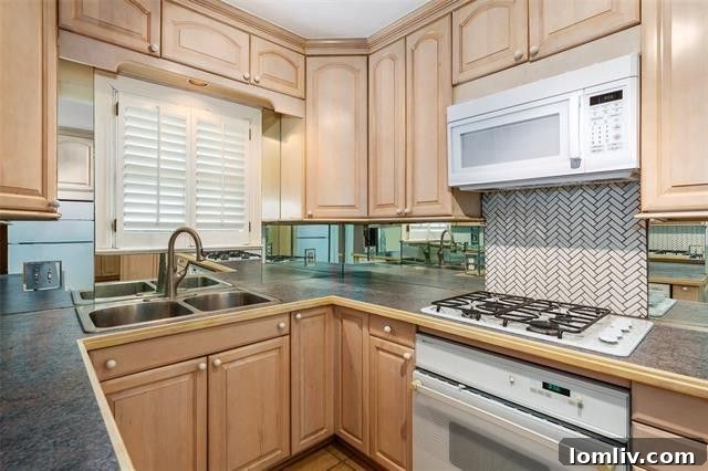 Kessler Park's Holiday Surprise: The Splurge Versus The Smart Steal 10 Cozy den featuring French doors opening to a lush courtyard view