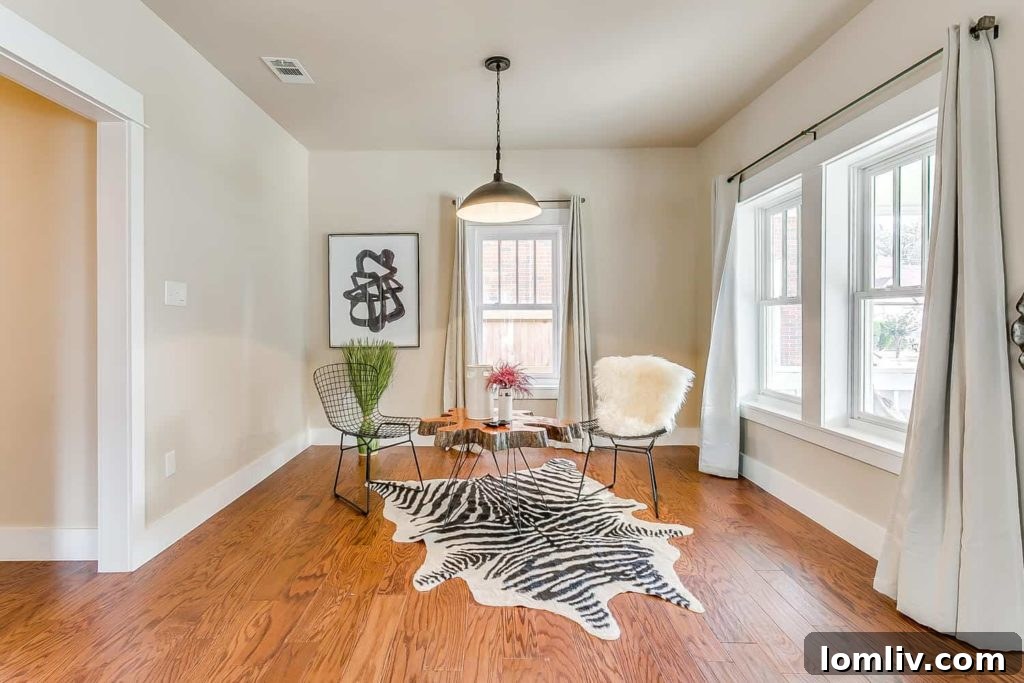 Inviting living room with an open floor plan in the updated Fairmount home at 1402 7th Avenue