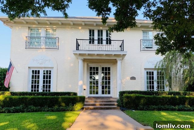 The elegant Wells home, a 2006 Georgian Revival style house featuring transitional French coastal decor