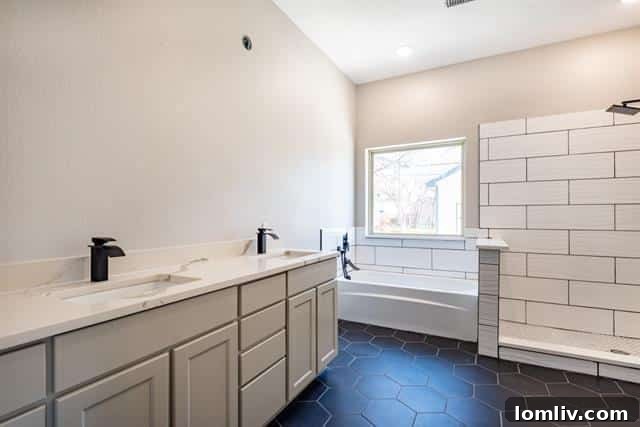 Modern kitchen with quartz countertops and stainless steel appliances
