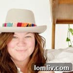 Portrait of Jessica Jamison, the innovative founder behind Wrecking Ball Collective, an enterprise focused on vintage furniture and unique Airbnb experiences.
