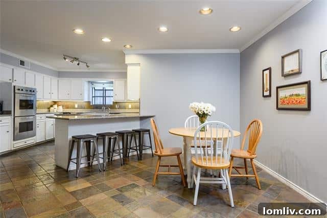 Your Choice: Two Exceptional North Dallas Homes Below $600K 5 Modern kitchen with stainless steel appliances and granite countertops