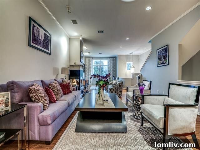 Elegant kitchen with Venetian quartz countertops and built-in bar in Dallas condo