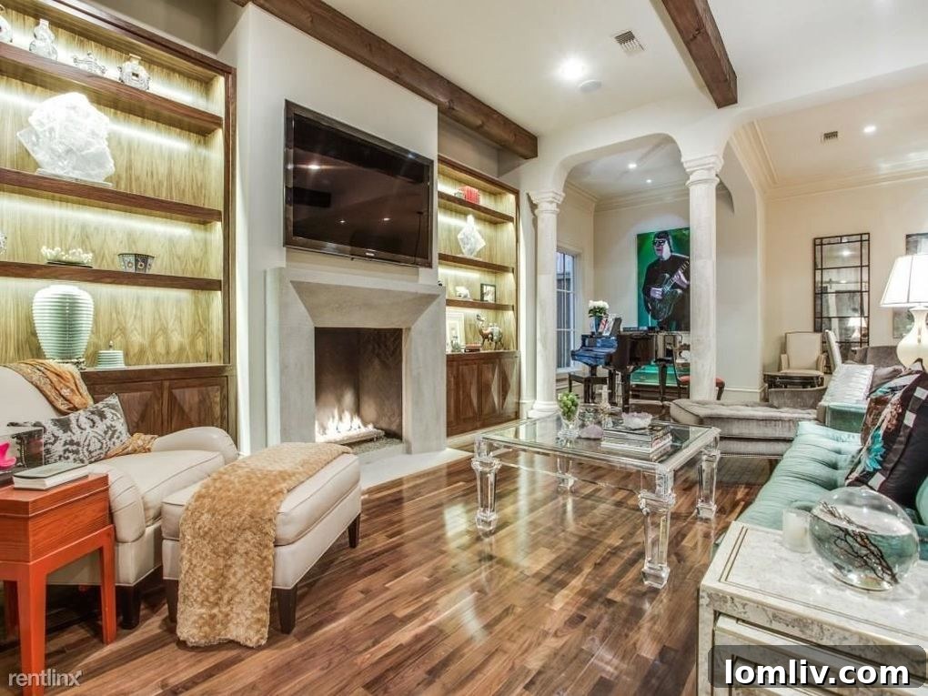 Well-appointed kitchen island with seating and modern lighting
