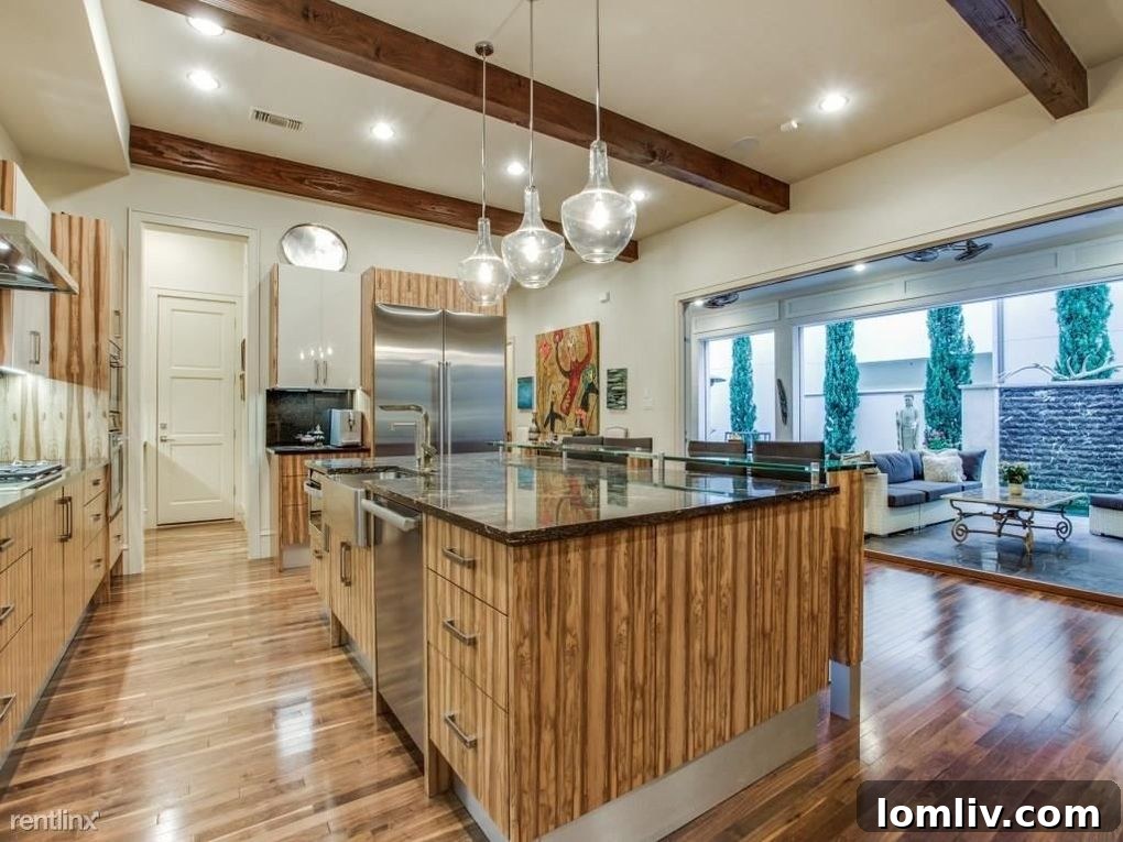 Elegant dining area with designer lighting and rich finishes