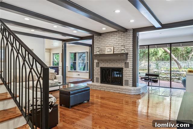Discreet and private street-facing facade of 208 Rockwood Park Drive, blending seamlessly with the natural surroundings.