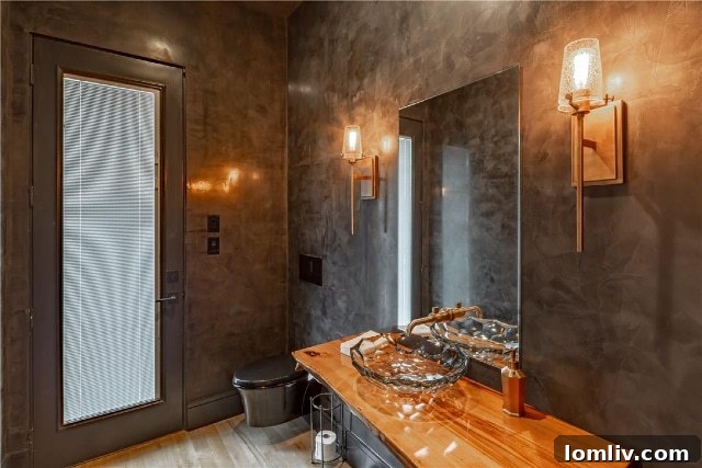Powder bathroom with black Venetian plaster walls