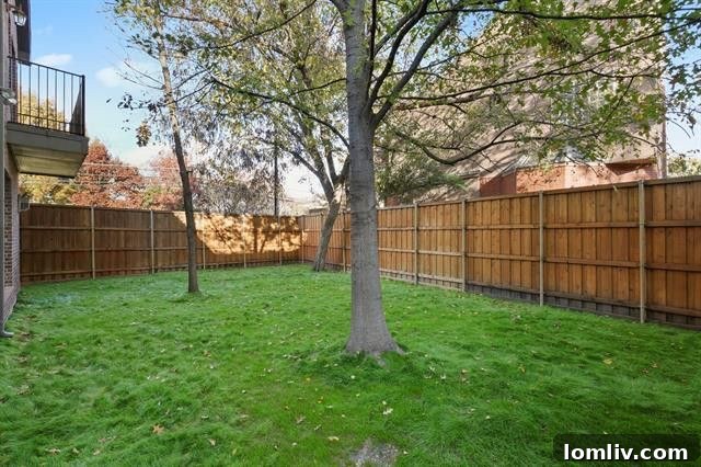 Spacious private backyard with lush greenery