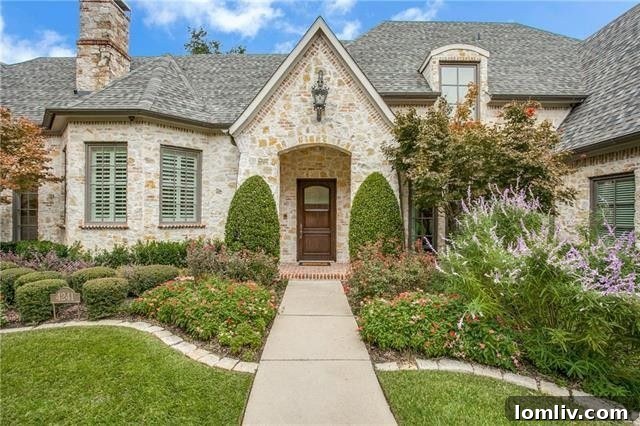 Exquisite traditional Dallas home, highlighting its timeless design and elegant curb appeal.