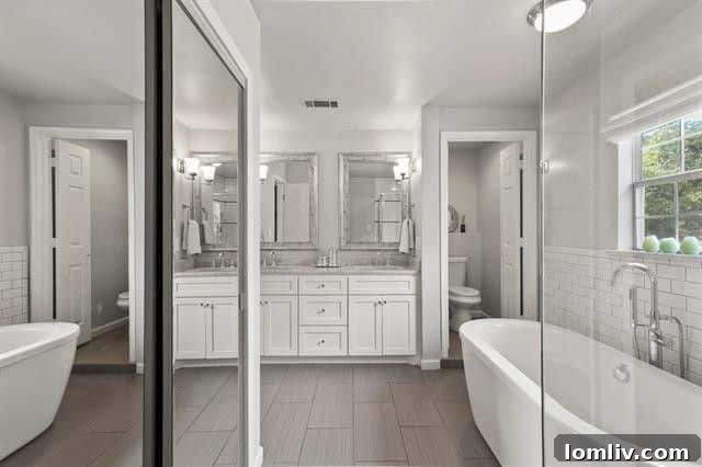 Luxurious master bedroom featuring a stunning barrel ceiling and ample natural light.