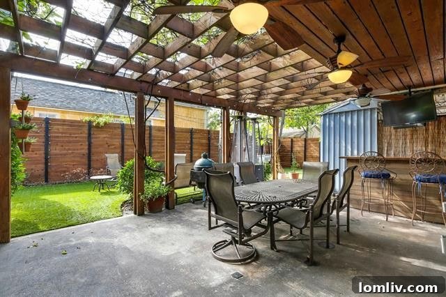 Beautiful backyard oasis with a fantastic pergola patio, perfect for outdoor entertainment.