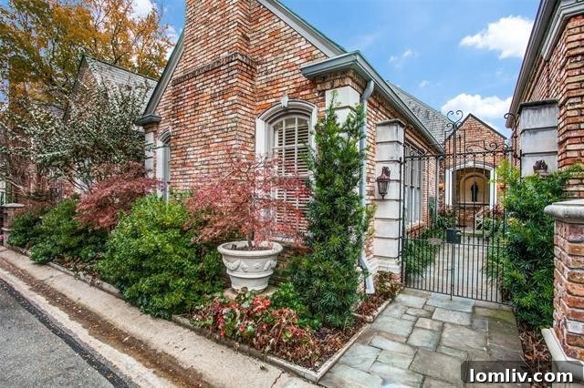 Charming brick traditional home with manicured landscaping in Caruth Hills, Dallas.