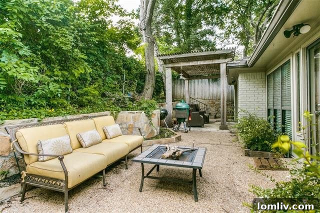 Arbor-covered patio garden off the master suite at 2815 Lawtherwood Place