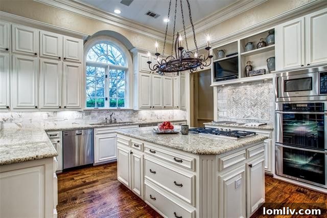 Elegant dining room with chandelier and large windows at 4001 W. Lawther Dr.