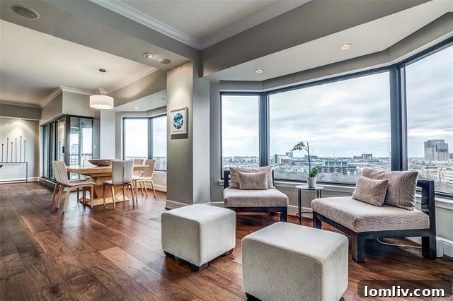 Spacious living room with floor-to-ceiling windows and downtown Dallas vista