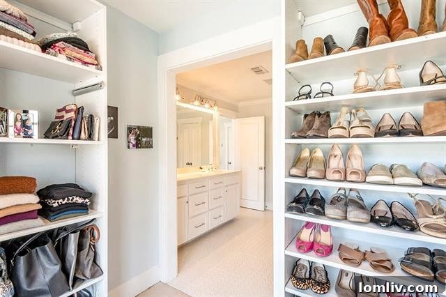 Luxurious master bathroom with a double shower, opalescent subway tiles, and multiple showerheads
