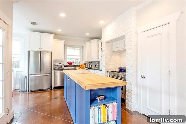 Close-up of the kitchen's modern stainless steel range and rustic brick niche