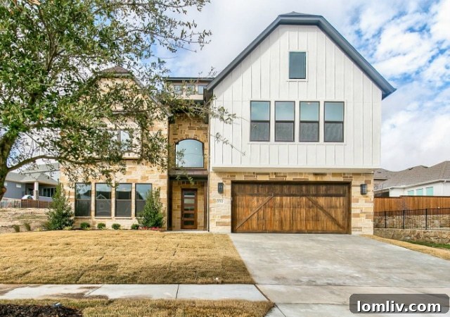 1712 Prairie Ridge Road by MK Homes in Walsh Phase I, showcasing unique topography utilization