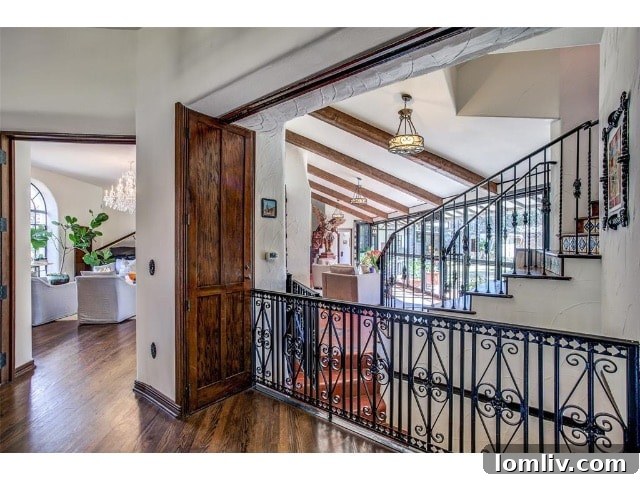 A Spanish Eclectic Reverie at The Forest Hills Cox Estate 7 Elegant Spanish Eclectic Interior with Archways and High Ceilings