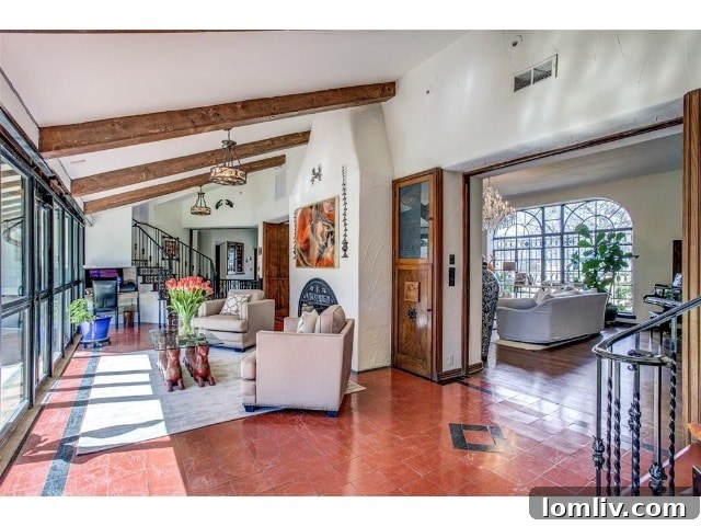A Spanish Eclectic Reverie at The Forest Hills Cox Estate 8 Luxurious Dining Area in Historic Dallas Home with Arch Details