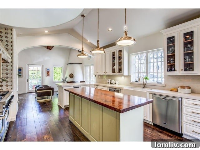 A Spanish Eclectic Reverie at The Forest Hills Cox Estate 9 Grand Living Room with Fireplace and Turret Light in Spanish Eclectic Home