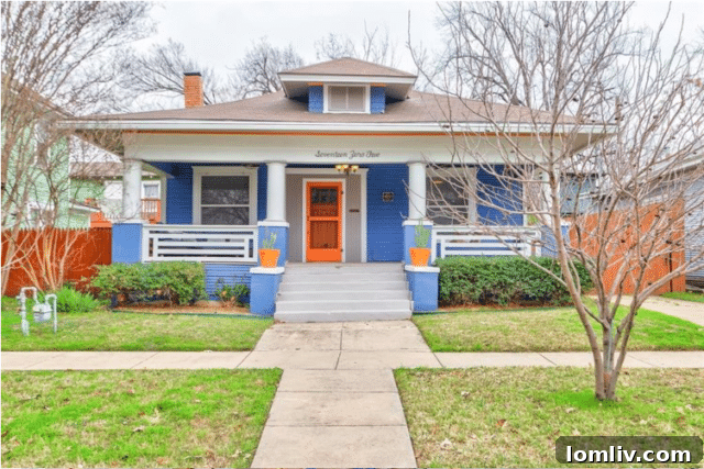 Vibrant blue Craftsman bungalow facade in historic Fairmount, Fort Worth