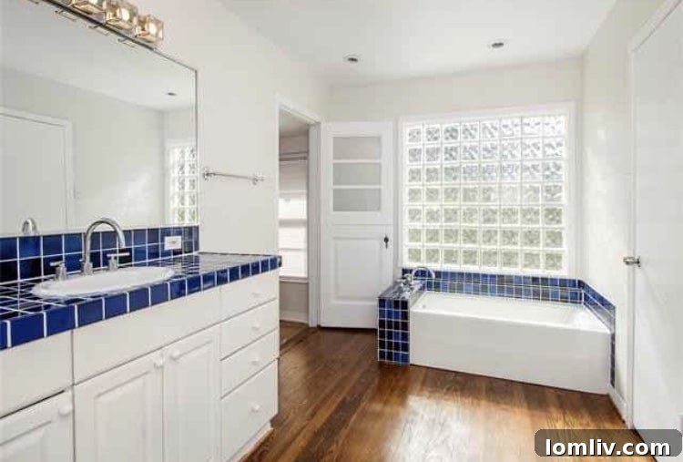 Modern kitchen with stylish countertops and stainless steel appliances