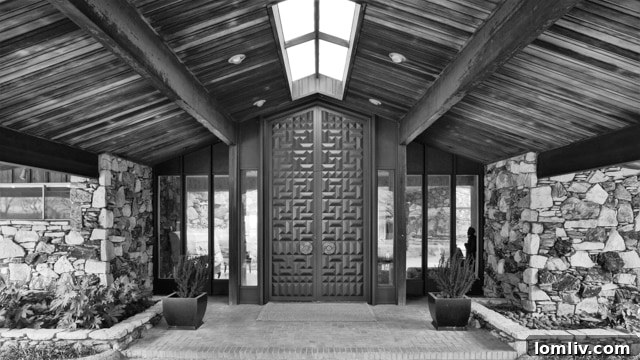 The reconstructed exterior of the Lobello House, showcasing Charles Dilbeck's original architectural vision.
