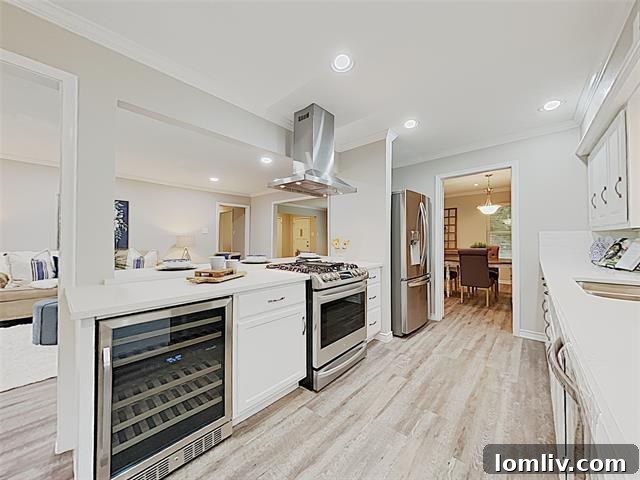 Contemporary open-concept living area with abundant natural light and brand new flooring, creating a bright and inviting atmosphere.