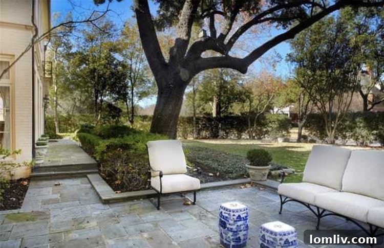 Luxurious outdoor patio area overlooking the pool at 3801 Maplewood Avenue