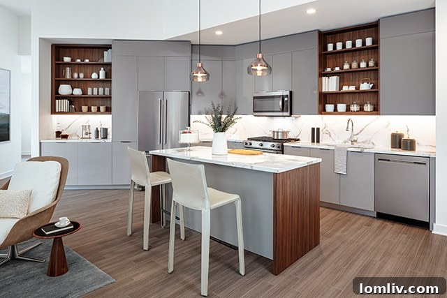 Three Decades On, AMLI Fountain Place Completes the Skyline, Closely Matching Cobb's Original Vision 6 AMLI Fountain Place kitchen with glossy millwork