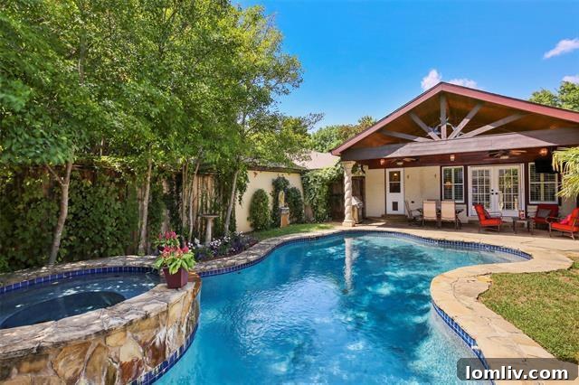 Luxury master suite with French doors to pool in Kessler Park
