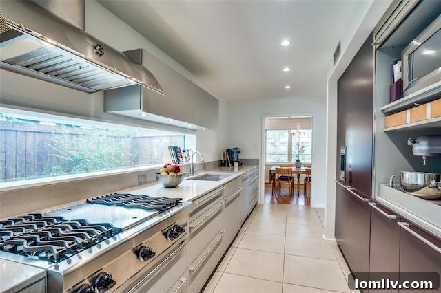 Gourmet kitchen with Bulthaup cabinetry in Midcentury Modern home
