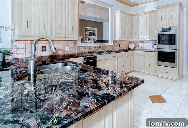 Gourmet Kitchen with Exotic Granite and Bosch Appliances