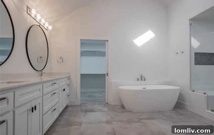 Sleek Modern Bathroom with Seamless Glass Shower in Southlake
