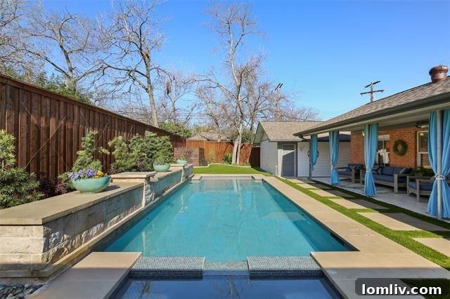 Santa Monica Pool Dreams Come True on San Mateo 3 Luxurious swimming pool and heated spa in the meticulously landscaped backyard of 7019 San Mateo Blvd, East Dallas