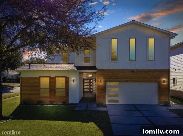 Experience Greenway Parks Luxury Now: Flexible Leasing, No Million-Dollar Commitment 2 Exterior view of the modern luxury home on Hopkins Avenue, Dallas